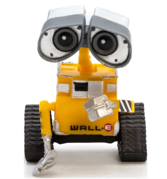 Toy figure of a robot with large eyes on a white background