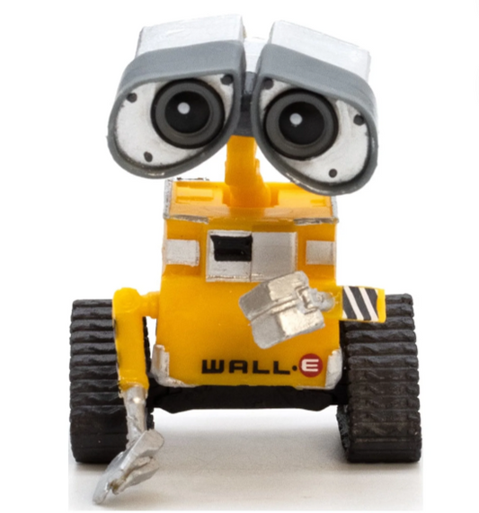 Toy figure of a robot with large eyes on a white background